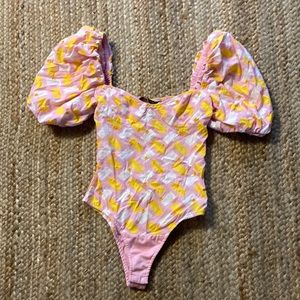 Zara snap onesie with puff sleeves never worn but needs to be steamed or iron